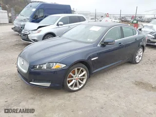 2015 Jaguar XF V6 Portfolio with VIN SAJWJ0FF5F8U67140, listed as a IAAI auction lot 41967522 with 68,000 mi miles. Bid and sale history available at carsss.com. Image 2.