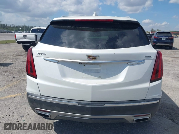 2020 Cadillac XT5 Premium Luxury FWD with VIN 1GYKNCRS7LZ129119, listed as a IAAI auction lot 41710878 with 52,575 mi miles and . Bid and sale history available at carsss.com. Image 16.