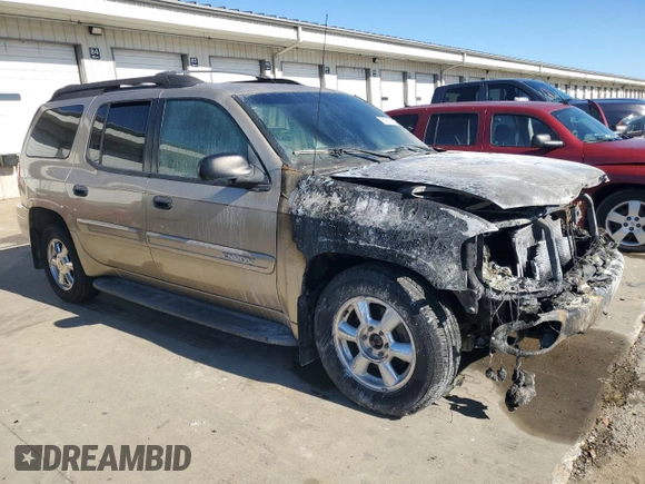 2004 GMC Envoy SLT z VIN 1GKET16S546133758, wystawiony jako Copart lot #76717674 z przebiegiem Nie podano mil oraz Szkoda całkowita • Salvage title. Historia ofert i sprzedaży dostępna na DreamBid. Obrazek 4.