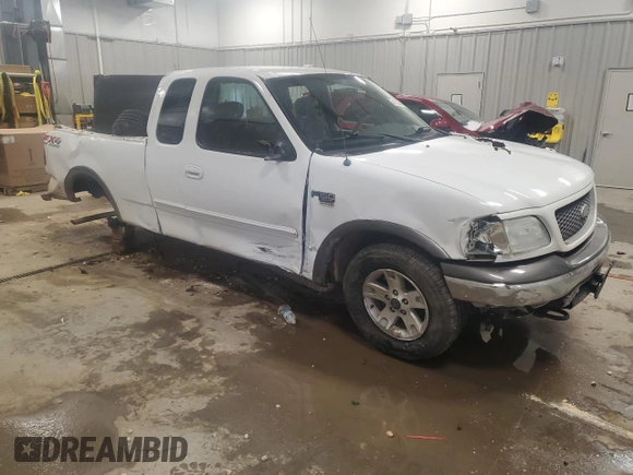 2003 Ford F-150 XL with VIN 1FTRX18L93NA40530, listed as a Copart auction lot 41596405 with 69,144 mi miles and Non Repairable. Bid and sale history available at carsss.com. Image 4.