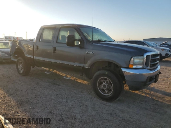 2002 Ford F-250 XL with VIN 3FTNW21F42MA14308, listed as a Copart auction lot 48522435 with 459,947 mi miles and Salvage title. Bid and sale history available at DreamBid. Image 4.