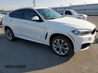 2018 BMW X6 xDrive35i with VIN 5UXKU2C52J0Z61957, listed as a Copart auction lot 73596543 with 87,119 mi miles. Bid and sale history available at carsss.com. Image 4.