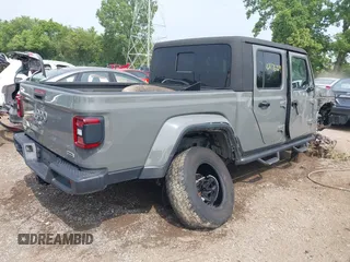 2020 Jeep Gladiator Overland with VIN 1C6HJTFG0LL169628, listed as a IAAI auction lot 42476729 with 102,874 mi miles and . Bid and sale history available at DreamBid. Image 4.