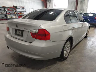 2006 BMW 3 Series 325i with VIN WBAVB17566NK33798, listed as a IAAI auction lot 42425997 with 210,994 mi miles and . Bid and sale history available at DreamBid. Image 4.