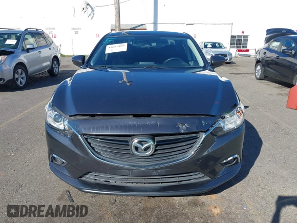 2016 Mazda 6 i Sport with VIN JM1GJ1U53G1400940, listed as a IAAI auction lot 41687400 with 77,737 mi miles and . Bid and sale history available at DreamBid. Image 12.