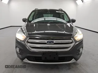 2018 Ford Escape SE with VIN 1FMCU0GD6JUA74555, listed as a Copart auction lot 54448535 with 114,848 mi miles and Clean Title. Bid and sale history available at carsss.com. Image 5.