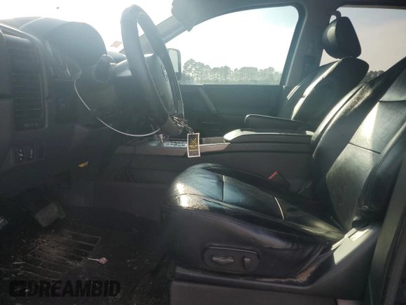 2010 Nissan Titan LE with VIN 1N6BA0EC6AN320790, listed as a Copart auction lot 52613495 with 224,118 mi miles and Salvage Title. Bid and sale history available at carsss.com. Image 7.