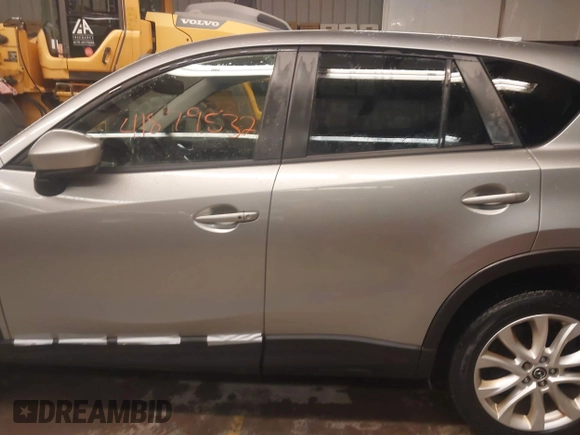 2014 Mazda CX-5 Grand Touring with VIN JM3KE4DY5E0305882, listed as a IAAI auction lot 41879532 with 173,443 mi miles. Bid and sale history available at carsss.com. Image 14.