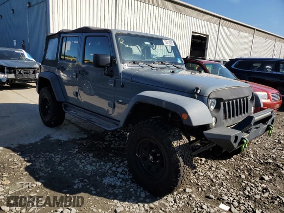 2015 Jeep Wrangler Unlimited Willys Wheeler with VIN 1C4BJWDG5FL609110, listed as a Copart auction lot 56013255 with 153,202 mi miles and Clean Title. Bid and sale history available at DreamBid. Image 4.
