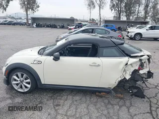 2013 MINI Coupe S with VIN WMWSX3C53DT466648, listed as a IAAI auction lot 41719597 with 106,936 mi miles and . Bid and sale history available at DreamBid. Image 15.