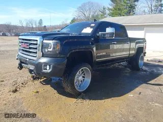 2017 GMC Sierra 2500HD SLT with VIN 1GT12TEY5HF249272, listed as a IAAI auction lot 41854590 with 134,866 mi miles. Bid and sale history available at carsss.com. Image 2.