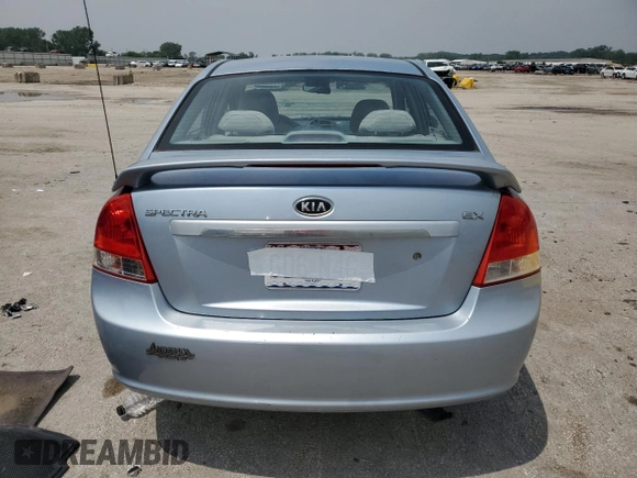 2007 Kia Spectra EX with VIN KNAFE121275411319, listed as a Copart auction lot 58716045 with 309,488 mi miles and Salvage title. Bid and sale history available at DreamBid. Image 6.