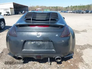 2009 Nissan 370Z z VIN JN1AZ44E19M405896, wystawiony jako IAAI lot #41889553 z przebiegiem 202 388 mil mil oraz . Historia ofert i sprzedaży dostępna na DreamBid. Obrazek 17.