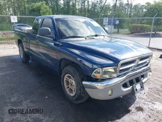 2000 Dodge Dakota z VIN 1B7GL22X3YS523895, wystawiony jako IAAI lot #42247540 z przebiegiem 159 138 mil mil oraz . Historia ofert i sprzedaży dostępna na DreamBid. Obrazek 1.