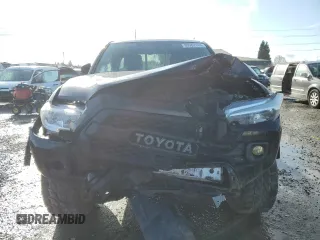 2016 Toyota Tacoma SR z VIN 5TFSX5EN7GX042706, wystawiony jako Copart lot #80982144 z przebiegiem 108 048 mil mil oraz Szkoda całkowita • Salvage title. Historia ofert i sprzedaży dostępna na DreamBid. Obrazek 5.