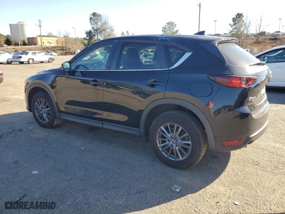 2021 Mazda CX-5 Touring with VIN JM3KFBCM7M1351884, listed as a Copart auction lot 89314565 with 32,934 mi miles and Salvage Title. Bid and sale history available at carsss.com. Image 2.