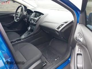 2018 Ford Focus SE z VIN 1FADP3F29JL235302, wystawiony jako IAAI lot #42262964 z przebiegiem 85 127 mil mil oraz . Historia ofert i sprzedaży dostępna na DreamBid. Obrazek 5.