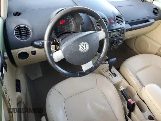 2009 Volkswagen New Beetle Coupe S with VIN 3VWRW31C59M504261, listed as a Copart auction lot 79912134 with 191,031 mi miles and Salvage Title. Bid and sale history available at carsss.com. Image 8.
