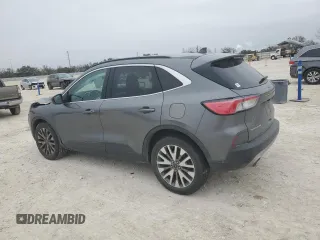 2021 Ford Escape Titanium with VIN 1FMCU9J9XMUA57500, listed as a Copart auction lot 46322915 with 67,101 mi miles and Salvage Title. Bid and sale history available at carsss.com. Image 2.