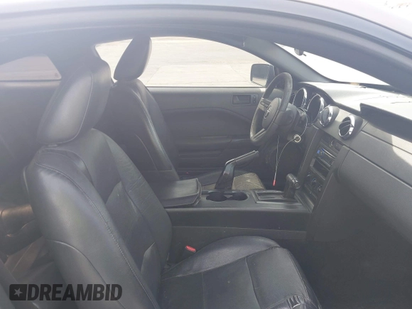 2005 Ford Mustang Deluxe with VIN 1ZVFT80N355185003, listed as a IAAI auction lot 42030961 with 219,973 mi miles. Bid and sale history available at carsss.com. Image 5.