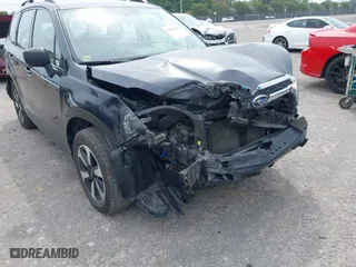 2018 Subaru Forester with VIN JF2SJABC3JH477514, listed as a IAAI auction lot 41880639 with 134,970 mi miles. Bid and sale history available at carsss.com. Image 6.