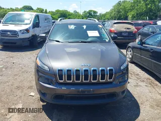 2014 Jeep Cherokee Latitude with VIN 1C4PJLCS0EW297415, listed as a IAAI auction lot 42198645 with 160,268 mi miles. Bid and sale history available at carsss.com. Image 12.