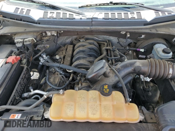 2015 Ford F-150 XL with VIN 1FTEW1CF3FFA48558, listed as a Copart auction lot 62067385 with 151,014 mi miles and Salvage title. Bid and sale history available at DreamBid. Image 11.