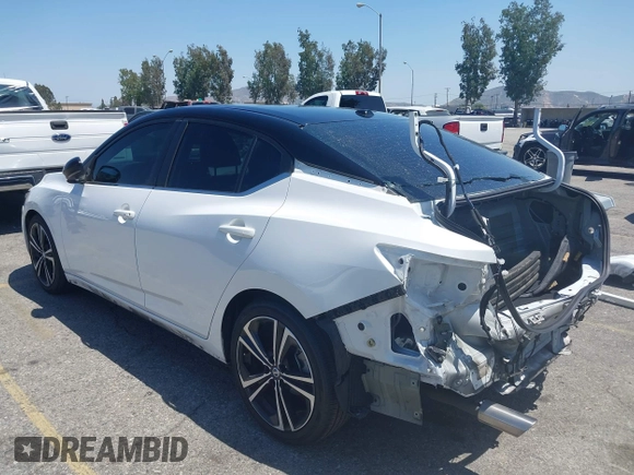 2021 Nissan Sentra SR z VIN 3N1AB8DV0MY245835, wystawiony jako IAAI lot #42320378 z przebiegiem 100 949 mil mil oraz . Historia ofert i sprzedaży dostępna na DreamBid. Obrazek 3.