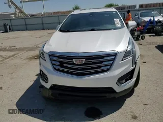2017 Cadillac XT5 FWD z VIN 1GYKNARS3HZ297366, wystawiony jako Copart lot #53908815 z przebiegiem 95 834 mil mil oraz Szkoda całkowita • Salvage title. Historia ofert i sprzedaży dostępna na DreamBid. Obrazek 14.