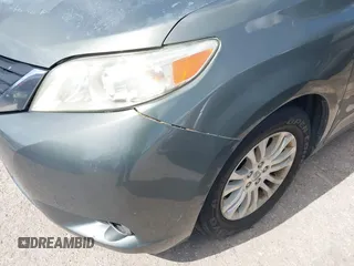2014 Toyota Sienna XLE with VIN 5TDYK3DC2ES448876, listed as a IAAI auction lot 42519351 with 154,601 mi miles and . Bid and sale history available at DreamBid. Image 6.