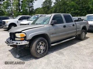 2003 GMC Sierra 1500HD SLE z VIN 1GTGC13U73F105405, wystawiony jako Copart lot #76817714 z przebiegiem 213 665 mil mil oraz Szkody całkowita. Historia ofert i sprzedaży dostępna na DreamBid. Obrazek 1.