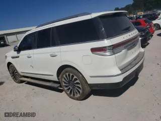 2022 Lincoln Navigator Black Label with VIN 5LMJJ2TT4NEL09900, listed as a Copart auction lot 74687794 with 0 mi miles and Salvage Title. Bid and sale history available at carsss.com. Image 2.