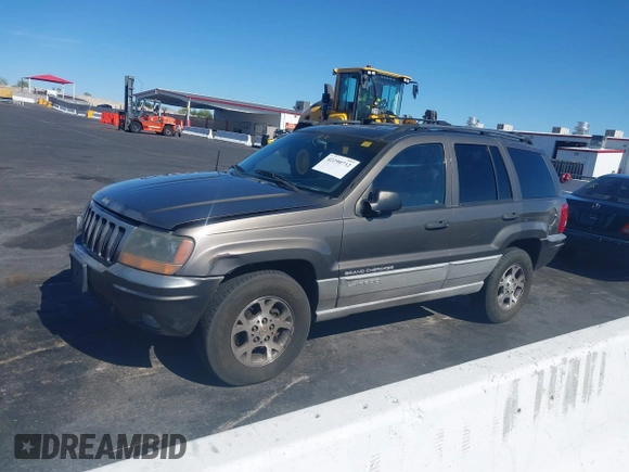 1999 Jeep Grand Cherokee Laredo with VIN 1J4GW58N2XC652678, listed as a IAAI auction lot 42290732 with 145,602 mi miles and . Bid and sale history available at DreamBid. Image 12.