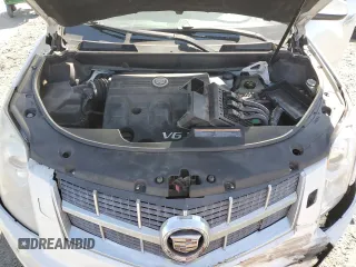 2012 Cadillac SRX Premium Collection with VIN 3GYFNFE39CS515037, listed as a Copart auction lot 55797235 with 146,778 mi miles and Salvage title. Bid and sale history available at DreamBid. Image 12.