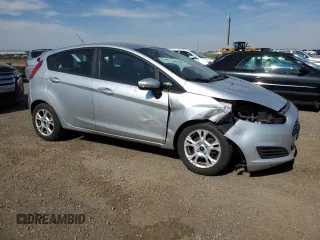 2015 Ford Fiesta SE z VIN 3FADP4EJ0FM212740, wystawiony jako Copart lot #63944573 z przebiegiem 123 037 mil mil oraz Szkoda całkowita • Salvage title. Historia ofert i sprzedaży dostępna na DreamBid. Obrazek 4.
