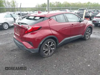 2019 Toyota C-HR XLE with VIN NMTKHMBX0KR088761, listed as a IAAI auction lot 42037328 with 28,501 mi miles and . Bid and sale history available at DreamBid. Image 4.