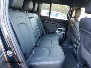 2023 Land Rover Defender S with VIN SALEJ7EX3P2121582, listed as a Copart auction lot 77433164 with 26,507 mi miles and Salvage title. Bid and sale history available at DreamBid. Image 11.