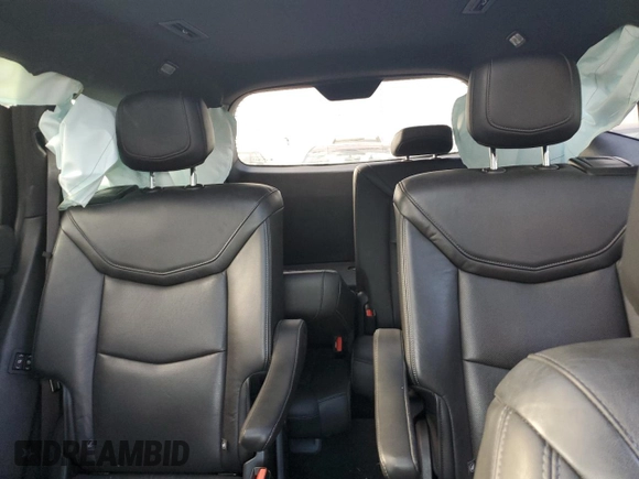 2020 Cadillac XT6 FWD Premium Luxury with VIN 1GYKPCRS2LZ138465, listed as a Copart auction lot 76114034 with 57,353 mi miles and Salvage Title. Bid and sale history available at carsss.com. Image 10.