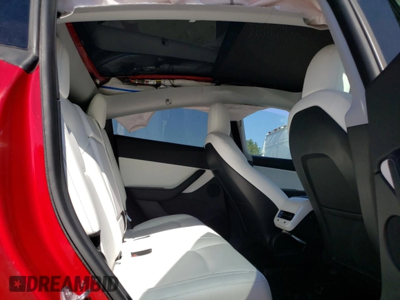 2020 Tesla Model Y Long Range z VIN 5YJYGDEE2LF040404, wystawiony jako Copart lot #54373645 z przebiegiem 40 981 mil mil oraz Szkoda całkowita • Salvage title. Historia ofert i sprzedaży dostępna na DreamBid. Obrazek 10.