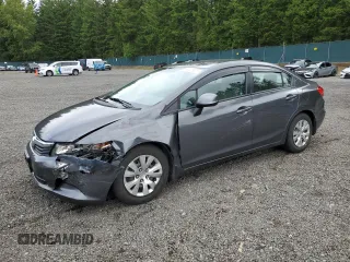 2012 Honda Civic LX z VIN 2HGFB2F52CH562700, wystawiony jako Copart lot #59325625 z przebiegiem 73 474 mil mil oraz Szkoda całkowita • Salvage title. Historia ofert i sprzedaży dostępna na DreamBid. Obrazek 1.