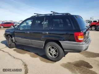 2002 Jeep Grand Cherokee Laredo with VIN 1J4GW48S82C241889, listed as a Copart auction lot 46252045 with 215,697 mi miles and Salvage Title. Bid and sale history available at carsss.com. Image 2.