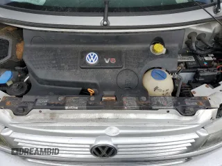 2002 Volkswagen EuroVan MV с VIN WV2MB47072H002990, выставлен на аукционе Copart как лот 85223854 с пробегом 153 893 миль миль и Чистый • Clean title. История ставок и продаж доступна на DreamBid. Изображение 12.