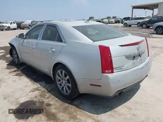 2009 Cadillac CTS RWD z VIN 1G6DV57V990149721, wystawiony jako IAAI lot #42293590 z przebiegiem 64 642 mil mil oraz . Historia ofert i sprzedaży dostępna na DreamBid. Obrazek 3.