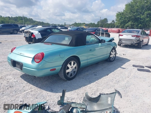 2003 Ford Thunderbird Deluxe z VIN 1FAHP60A33Y110451, wystawiony jako IAAI lot #42133863 z przebiegiem Nie podano mil oraz . Historia ofert i sprzedaży dostępna na DreamBid. Obrazek 4.