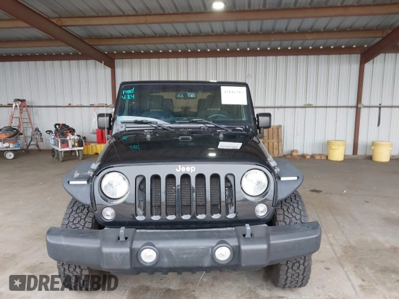 2015 Jeep Wrangler Sport with VIN 1C4AJWAG8FL550635, listed as a IAAI auction lot 42116285 with 111,782 mi miles. Bid and sale history available at carsss.com. Image 12.