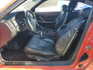 1984 Nissan 300ZX z VIN JN1CZ14SXEX009648, wystawiony jako Copart lot #56090024 z przebiegiem 48 776 mil mil oraz Szkody całkowita. Historia ofert i sprzedaży dostępna na DreamBid. Obrazek 7.