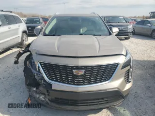 2022 Cadillac XT4 FWD Luxury with VIN 1GYAZAR4XNF121008, listed as a Copart auction lot 77599974 with 29,141 mi miles and Salvage title. Bid and sale history available at DreamBid. Image 5.