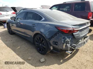 2021 Mazda 6 Grand Touring Reserve with VIN JM1GL1WY4M1616390, listed as a Copart auction lot 68140444 with 21,674 mi miles and Salvage Title. Bid and sale history available at DreamBid. Image 2.
