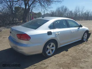 2013 Volkswagen Passat SE w/Sunroof & Nav with VIN 1VWBH7A33DC145554, listed as a IAAI auction lot 41808150 with 142,051 mi miles. Bid and sale history available at carsss.com. Image 4.