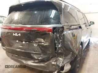 2025 Kia Carnival SX with VIN KNDNE5K33S6467800, listed as a IAAI auction lot 41624780 with 4,456 mi miles and . Bid and sale history available at DreamBid. Image 6.